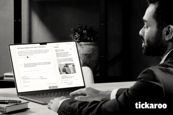A young man is using Tickaroo Live Blog on his laptop